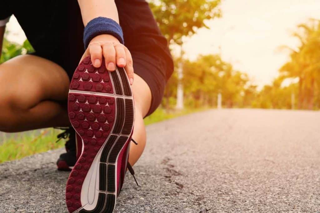 Man stretching foot